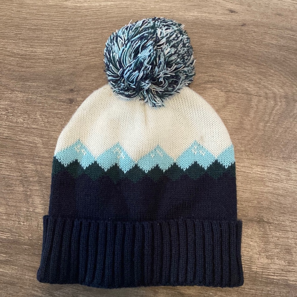 Beanie with puff ball on top one size